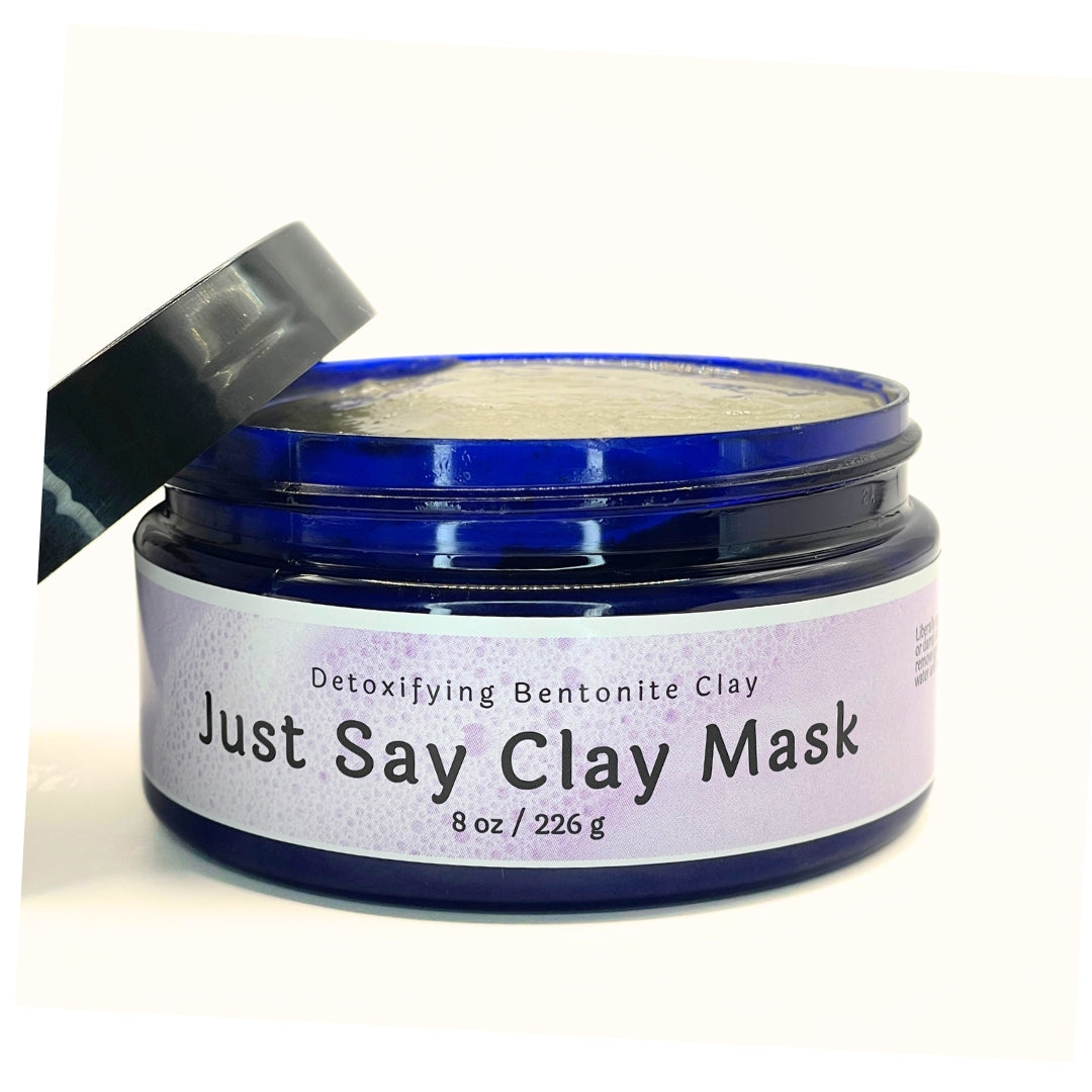 Just Say Clay mask jar, showcasing the rich, textured blend of Bentonite Clay and Apple Cider Vinegar.