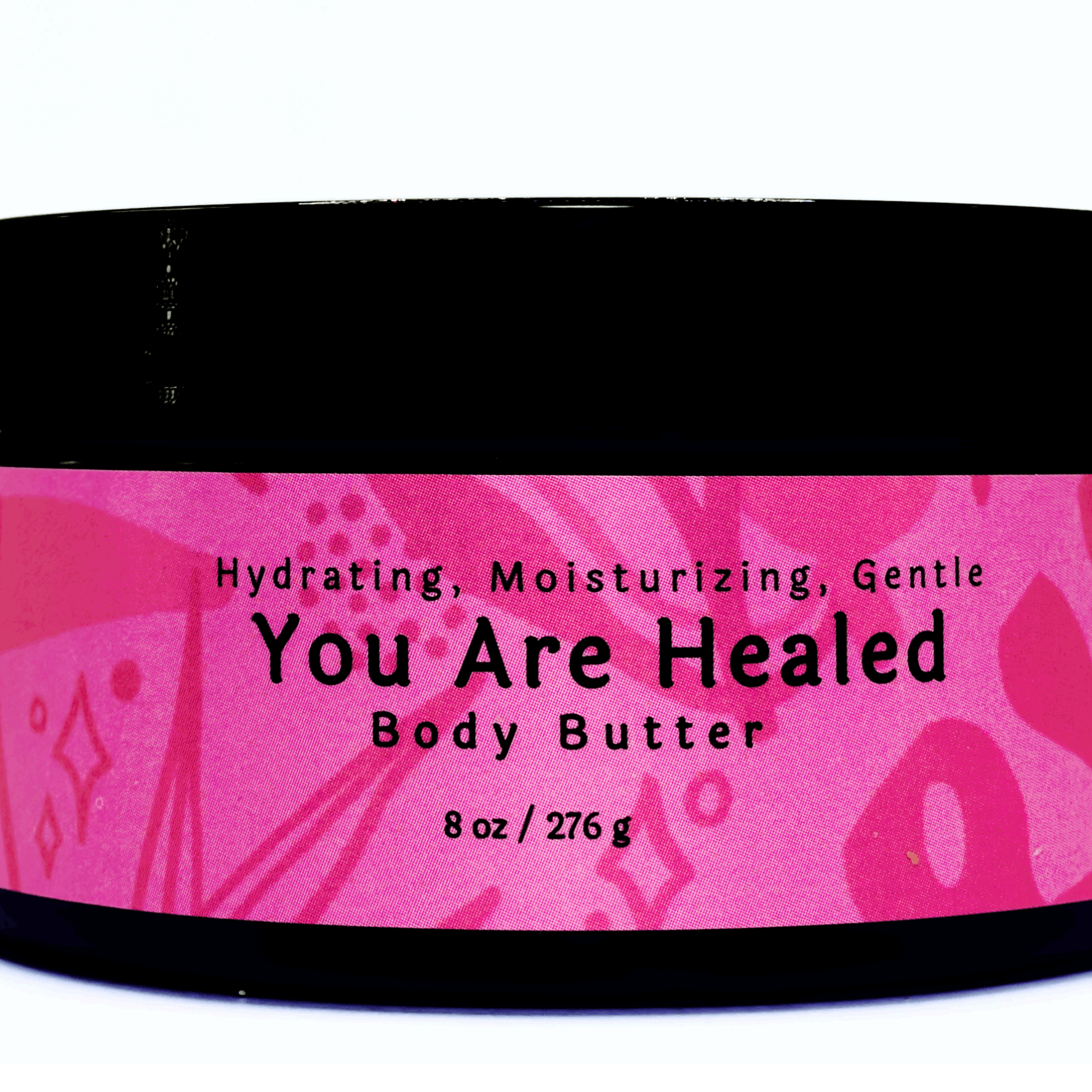 Jar of You Are Healed Body Butter showing its rich, creamy texture and elegant packaging.