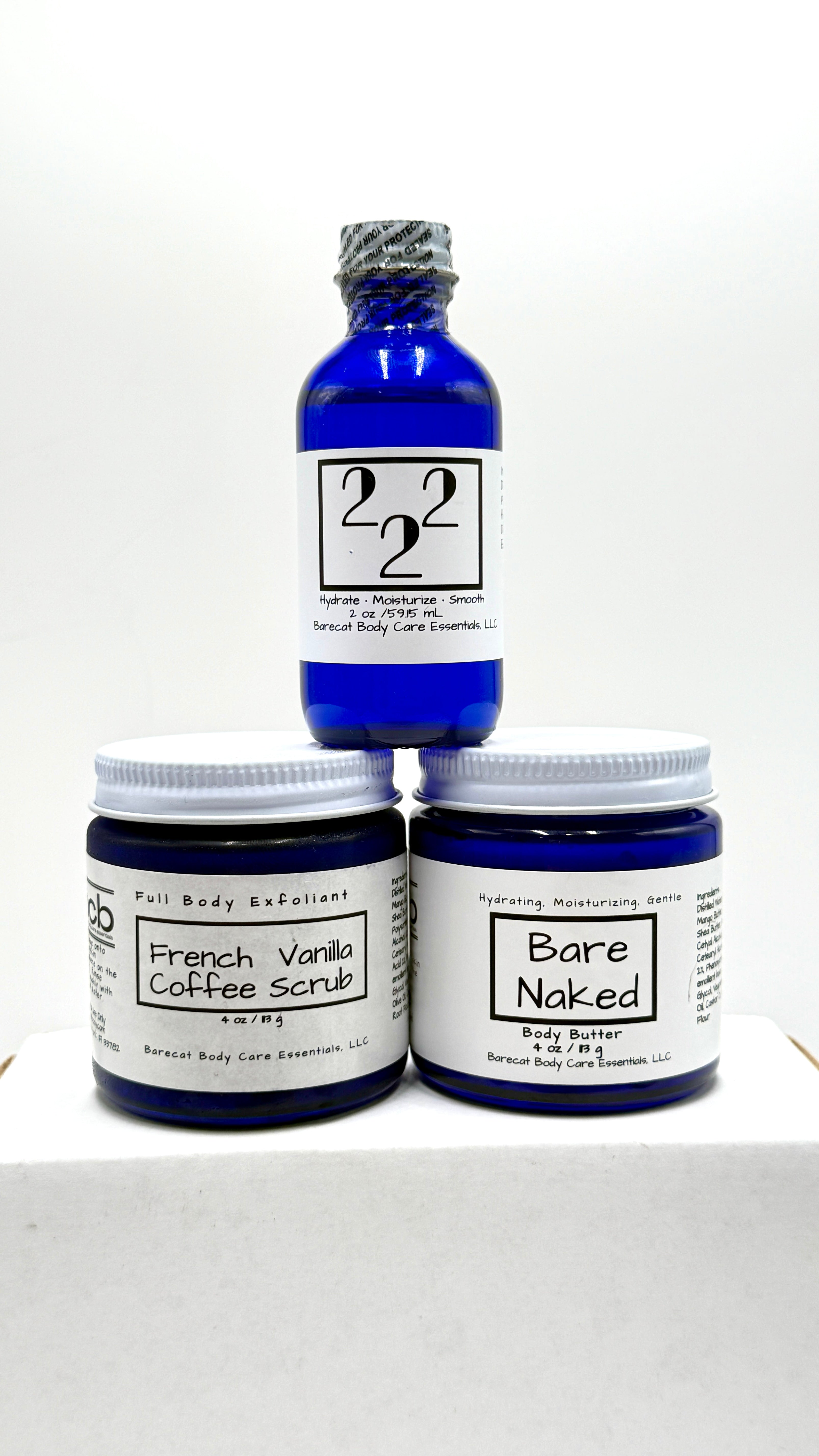 Barecat Body skin care bundle featuring scrub, moisturizer, and oil