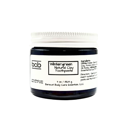 Jar of BCB Wintergreen Natural Clay Toothpaste on a white background